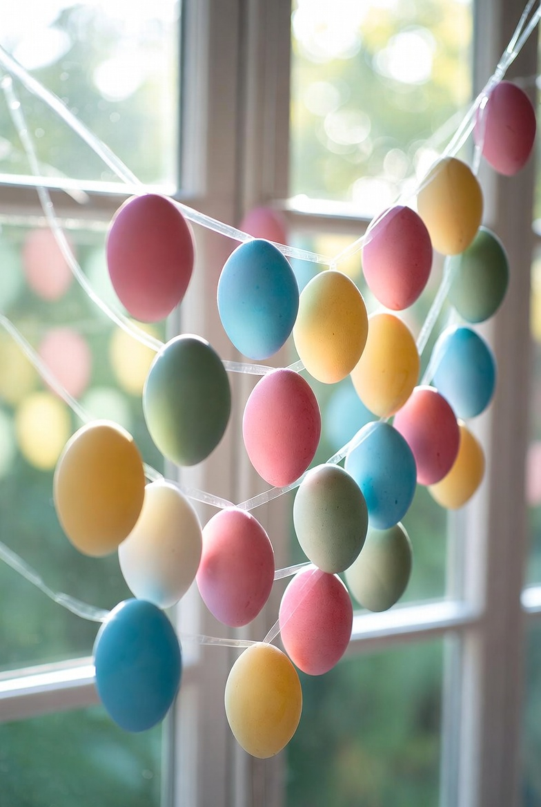 Colorful Easter eggs hanging in a window display